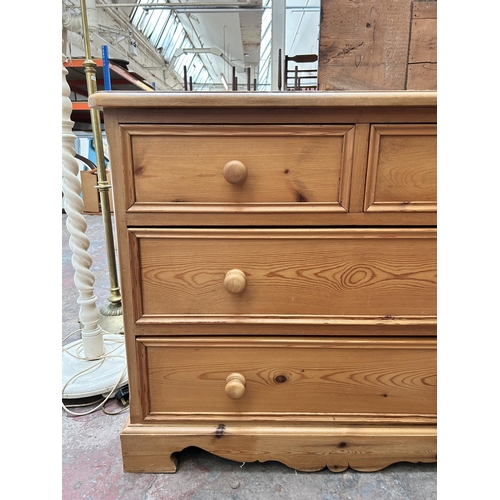 1 - A pine chest of two short over two long drawers - approx. 84cm high x 102cm wide x 47cm deep