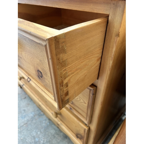 1 - A pine chest of two short over two long drawers - approx. 84cm high x 102cm wide x 47cm deep