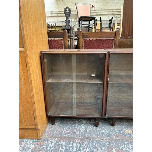 101 - Two 1960s Beaver & Tapley Multi-Width teak bookcases