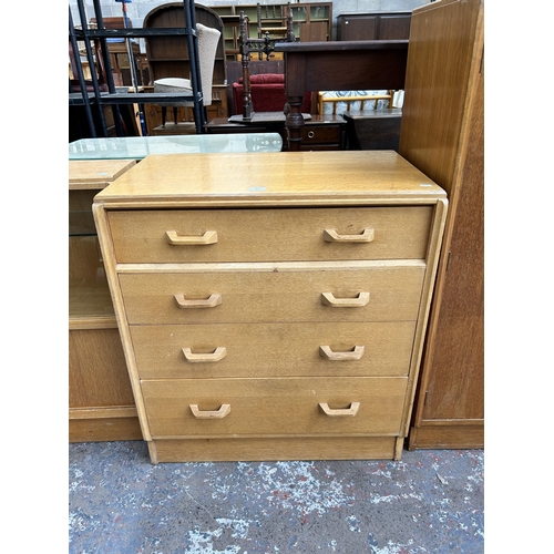 103 - A 1950s G Plan Brandon oak chest of four drawers