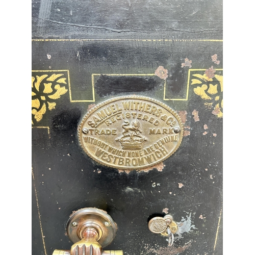 108 - A Victorian Samuel Withers & Co West Bromwich cast iron safe with key - approx. 71cm high x 51cm wid... 