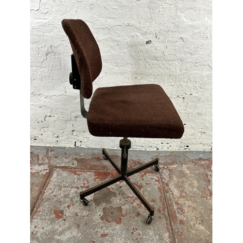 113 - A 1970s Matthews brown fabric and black metal posture chair