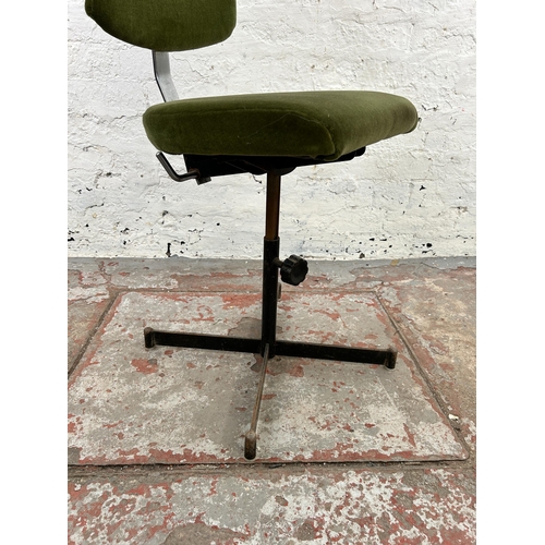 114 - A 1970s Tan-Sad green fabric and black metal swivel office desk chair