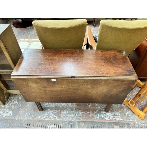 116 - A George III mahogany drop leaf dining table - approx. 73cm high x 106cm wide x 121cm long