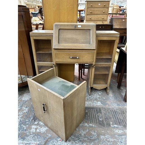 117 - An early/mid 20th century oak side by side bureau bookcase and stool