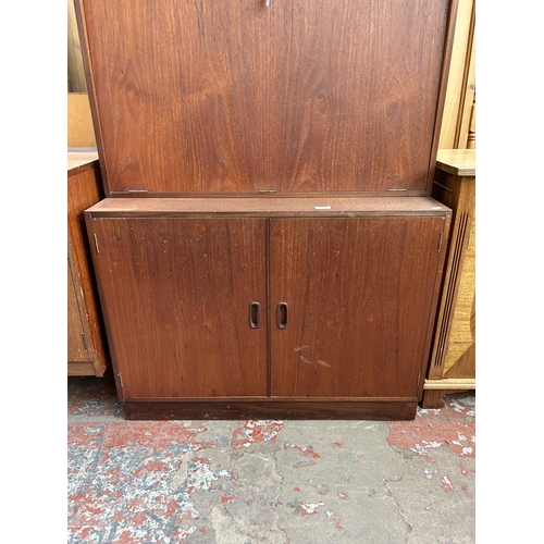 137 - A mid 20th century teak bureau bookcase