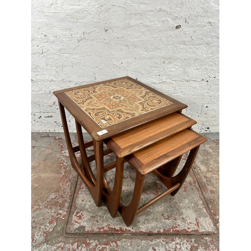 14 - A G Plan Astro teak and tiled top nest of three tables