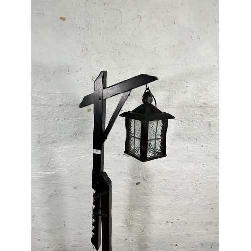 142 - A beech hanging lantern standard lamp - approx. 151cm high