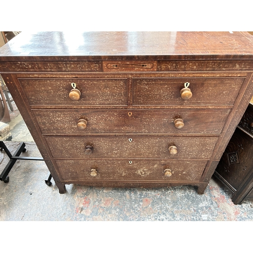 15 - A 19th century inlaid mahogany chest of two short over three long drawers