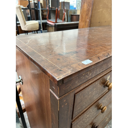 15 - A 19th century inlaid mahogany chest of two short over three long drawers