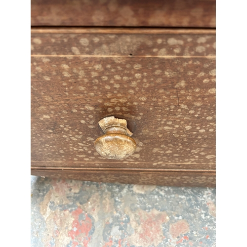 15 - A 19th century inlaid mahogany chest of two short over three long drawers