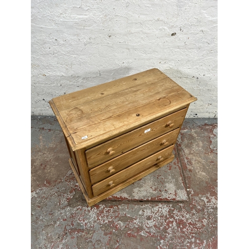 152 - A pine chest of three drawers