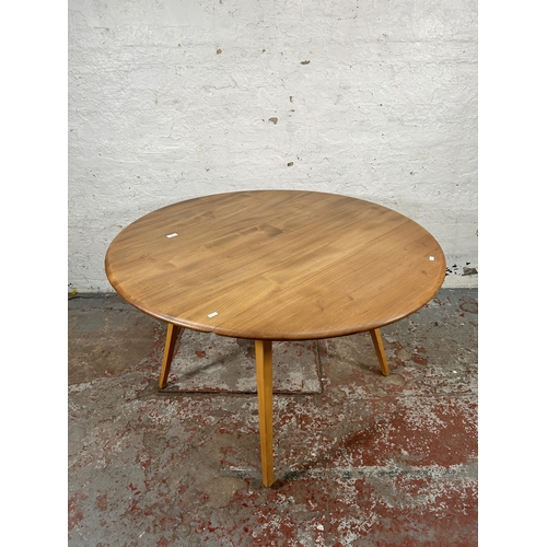 156 - An Ercol Windsor blonde elm and beech drop leaf oval dining table - approx. 73cm high x 113cm wide x... 