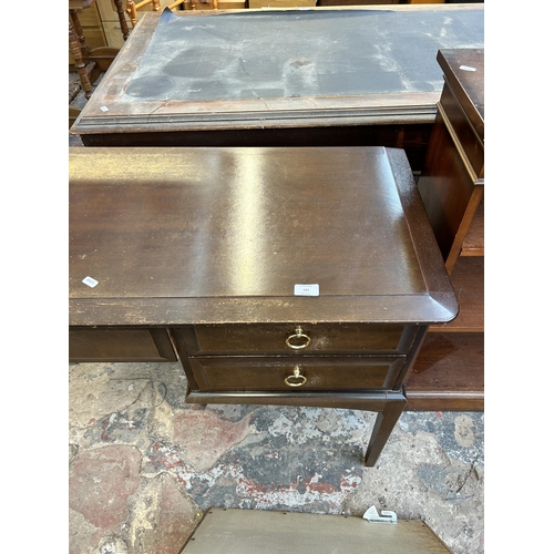 183 - A Stag Minstrel mahogany dressing table with five drawers and upper mirror