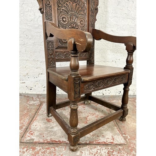 186 - A 17th century style carved oak Wainscot chair - approx. 126cm high x 58cm wide x 46cm deep