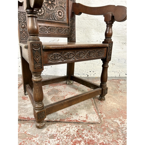 186 - A 17th century style carved oak Wainscot chair - approx. 126cm high x 58cm wide x 46cm deep