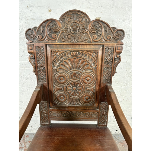 186 - A 17th century style carved oak Wainscot chair - approx. 126cm high x 58cm wide x 46cm deep