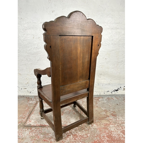 186 - A 17th century style carved oak Wainscot chair - approx. 126cm high x 58cm wide x 46cm deep