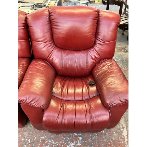 188 - A modern red leather reclining three piece lounge suite comprising three seater sofa and two armchai... 