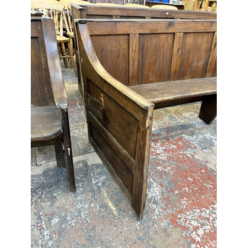 199 - An early 20th century pine curved church pew - approx. 86cm high x 190cm wide x 79cm deep