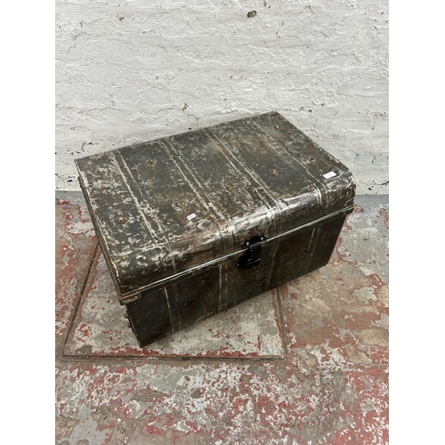 2 - An early/mid 20th century tin travel trunk