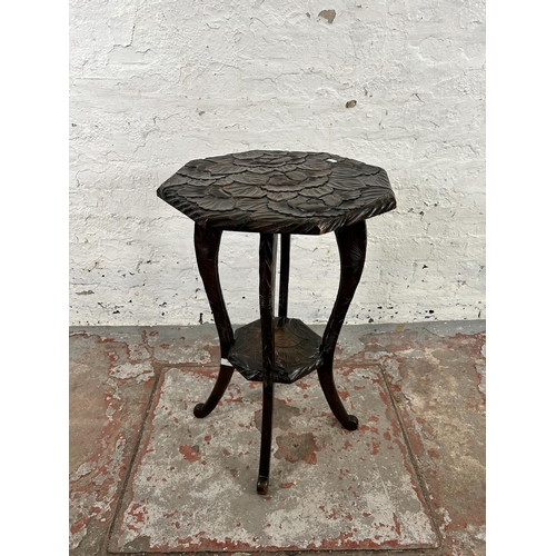 28 - A Liberty's of London hand carved octagonal two tier side table, circa 1905 - approx. 72cm high x 45... 