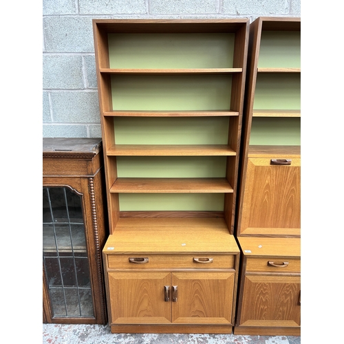 30 - A 1970s G Plan teak bookcase with single drawer and two lower cupboard doors - approx. 200cm high x ... 