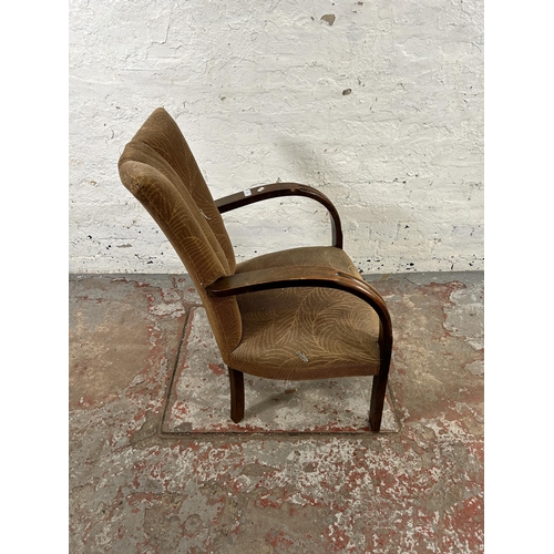 39 - A mid 20th century Art Deco style beech bentwood and brown fabric armchair