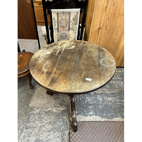 45 - A Georgian style beech circular tripod pedestal occasional table