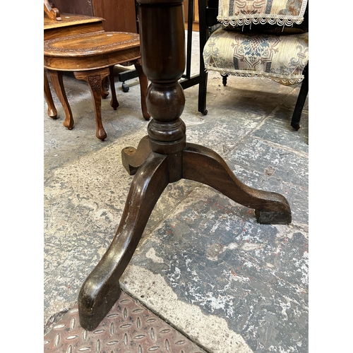 45 - A Georgian style beech circular tripod pedestal occasional table