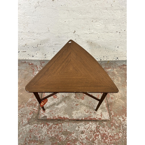 45A - A 1960s G Plan model 8015 tola wood triangular coffee table - approx. 49cm high x 66cm wide x 59cm d... 