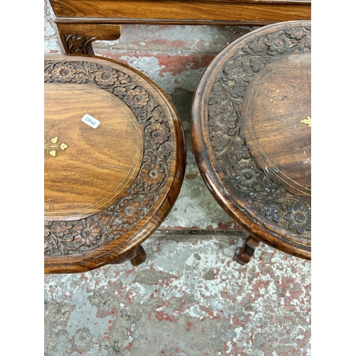 45B - Four Indian carved hardwood and brass inlaid occasional tables