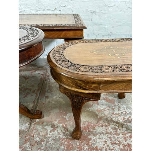 45B - Four Indian carved hardwood and brass inlaid occasional tables