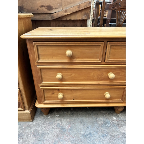 5 - A pine chest of three short over four long drawers - approx. 73cm high x 152cm wide x 46cm deep