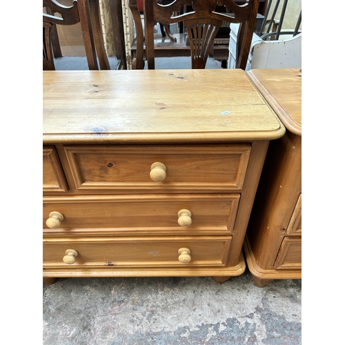 5 - A pine chest of three short over four long drawers - approx. 73cm high x 152cm wide x 46cm deep