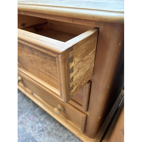 5 - A pine chest of three short over four long drawers - approx. 73cm high x 152cm wide x 46cm deep