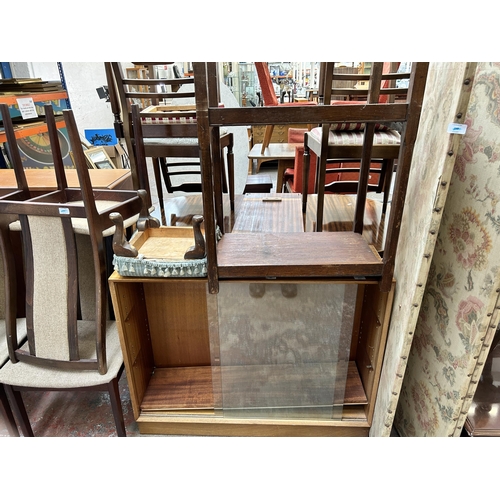 55 - Thirty one pieces of house clearance furniture to include mid 20th century teak bookcase, early 20th... 