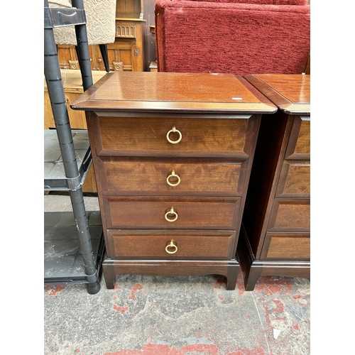 65 - A pair of Stag Minstrel mahogany bedside chests of four drawers