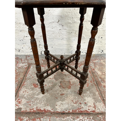 66 - An Edwardian mahogany octagonal occasional table