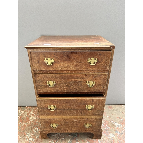 74 - A Georgian mahogany chest of four drawers with bracket supports - approx. 78cm high x 49cm wide x 37... 