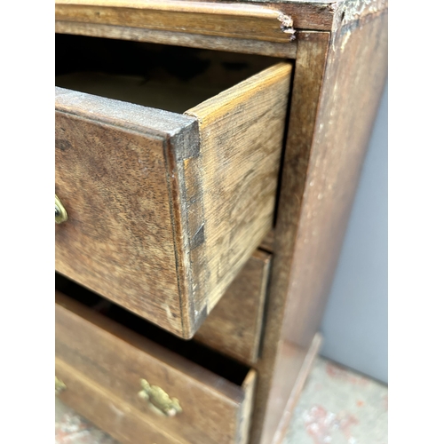 74 - A Georgian mahogany chest of four drawers with bracket supports - approx. 78cm high x 49cm wide x 37... 