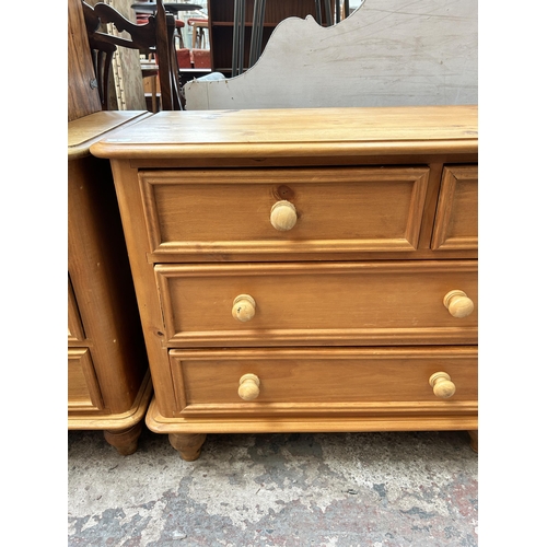 8 - A pine chest of three short over four long drawers - approx. 73cm high x 153cm wide x 46cm deep