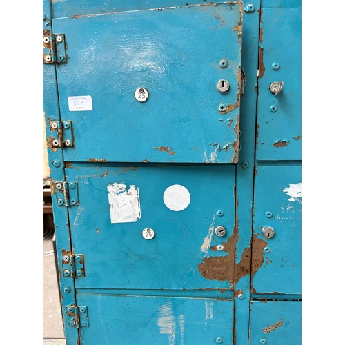 87A - A painted metal industrial locker cabinet - approx. 181cm high x 90cm wide x 46cm deep