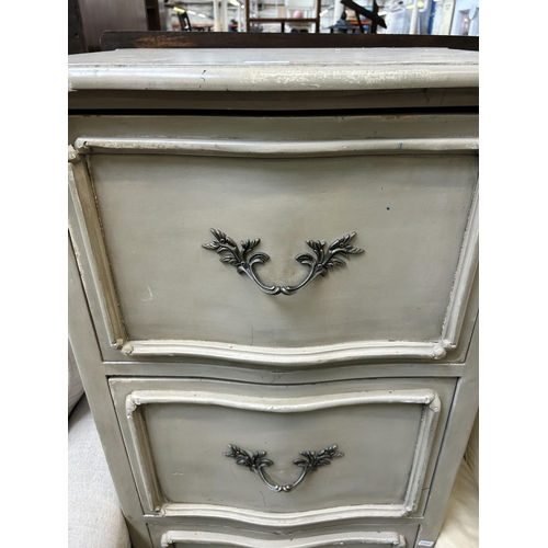 89 - A French style grey painted chest of three drawers with cabriole supports