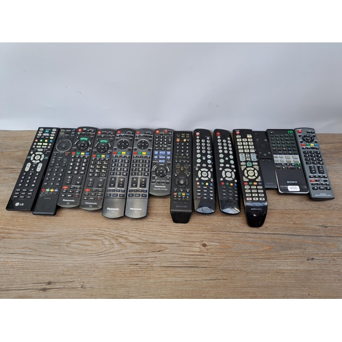 599 - A collection of Panasonic and Sony DVD players and recorders with a selection of remote controls