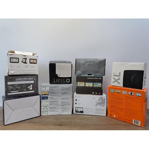 602 - A large collection of boxed Sat Navs to include Garmin Drive Smart 51, TomTom Start 52, TomTom XL 2 ... 