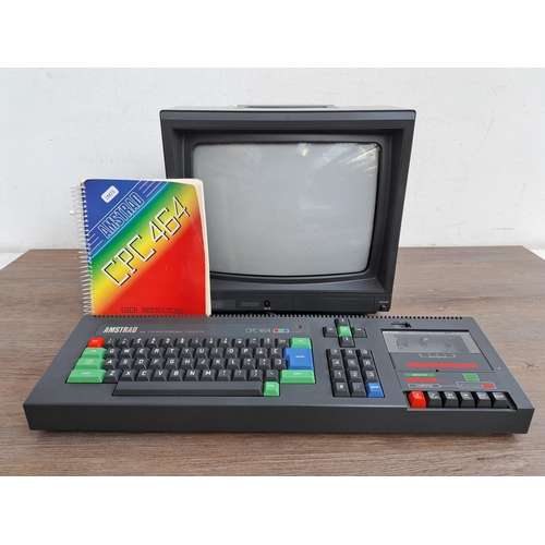 608 - An Amstrad CPC 464 colour personal computer with Amstrad CTM 644 full colour visual display unit, bo... 