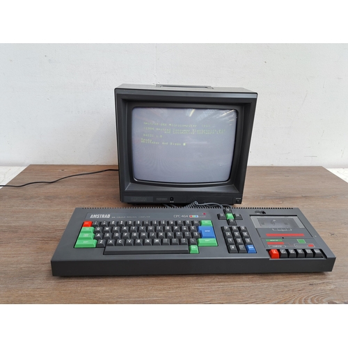 608 - An Amstrad CPC 464 colour personal computer with Amstrad CTM 644 full colour visual display unit, bo... 