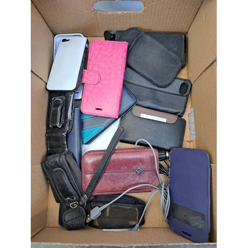 612 - A collection of mobile phone accessories to include Sony Ericsson Walkman phone, power banks, cases ... 