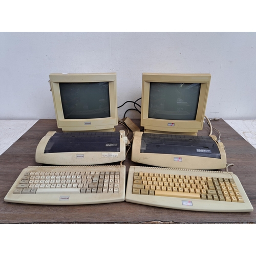 614 - Two 1990s Amstrad personal computers with printers and keyboards, one PcW10 and one PcW9256